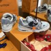 sy_no_37886ACC149AB055BAE775186D69ED92_2 Louis Vuitton Men's Navy Blue Denim LV Trainer Sneakers