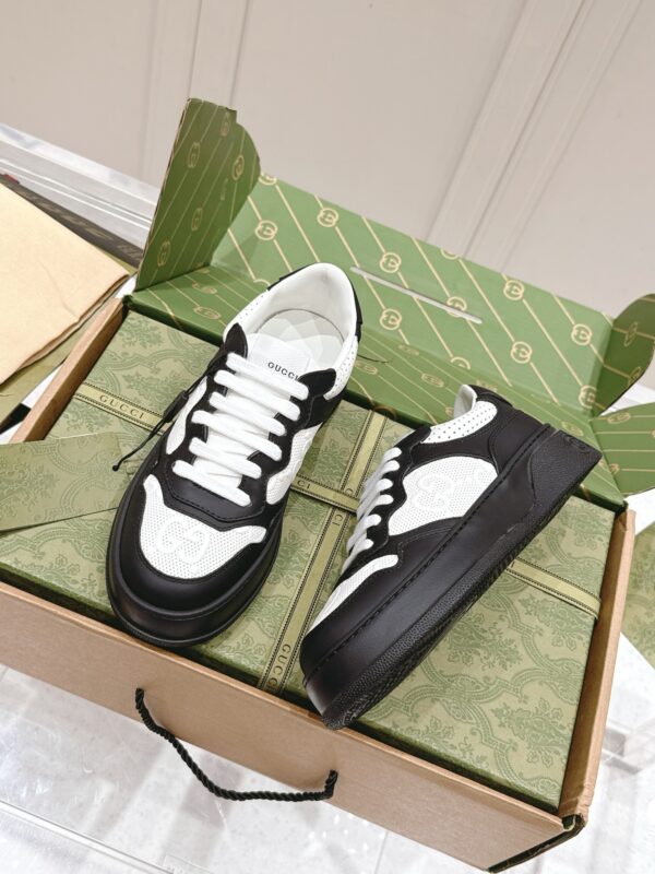 sy_no_38AC2F3EBB547AAD23D568A99A434CA3_0 Gucci GG Embossed Leather Platform Sneaker – Black / White