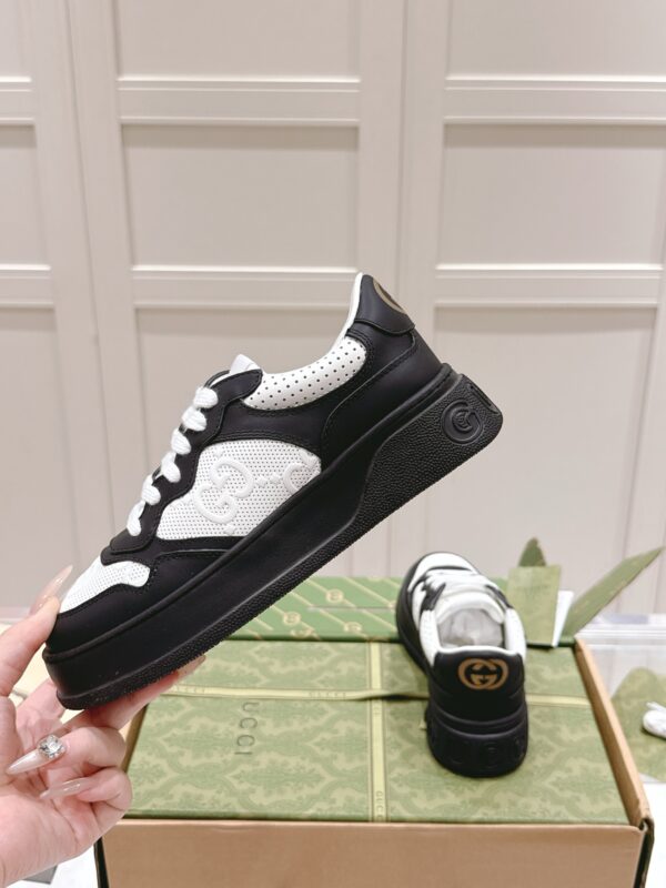 sy_no_38AC2F3EBB547AAD23D568A99A434CA3_4 Gucci GG Embossed Leather Platform Sneaker – Black / White