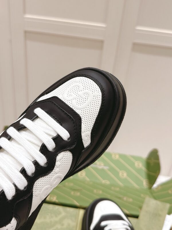 sy_no_38AC2F3EBB547AAD23D568A99A434CA3_5 Gucci GG Embossed Leather Platform Sneaker – Black / White