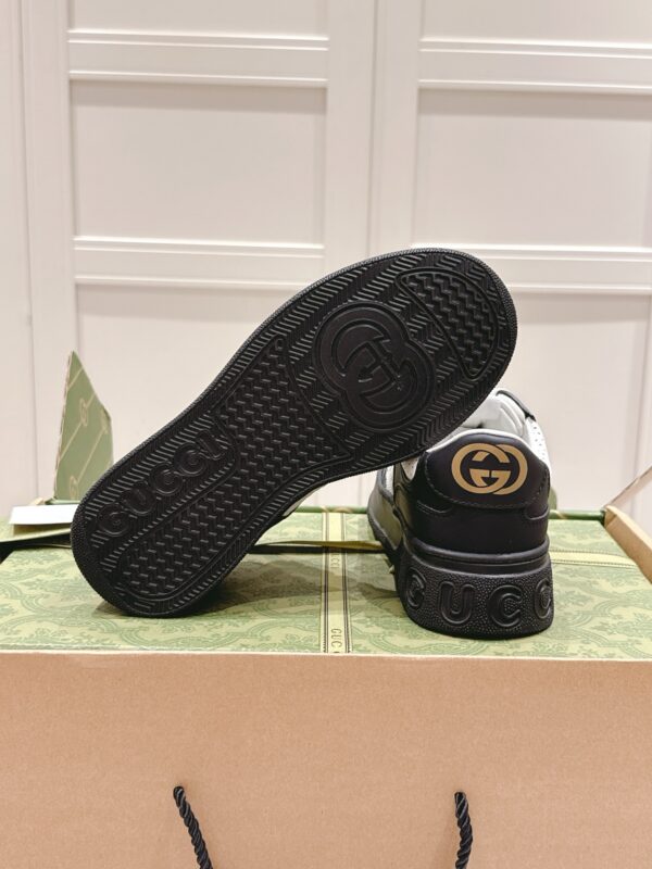 sy_no_38AC2F3EBB547AAD23D568A99A434CA3_8 Gucci GG Embossed Leather Platform Sneaker – Black / White