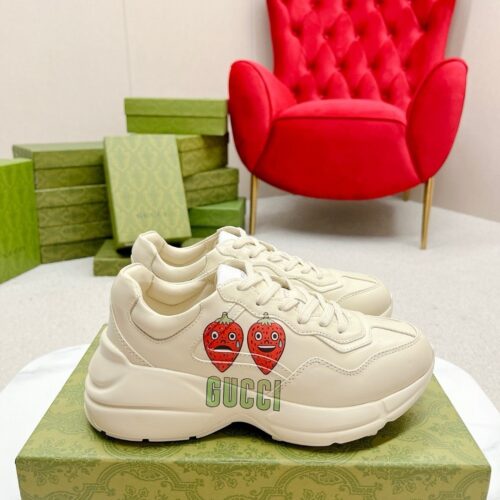 sy_no_38E11D82A9122100A41DA843EA6B6F7A_0 Gucci Rhyton Strawberry Print Sneaker – Ivory