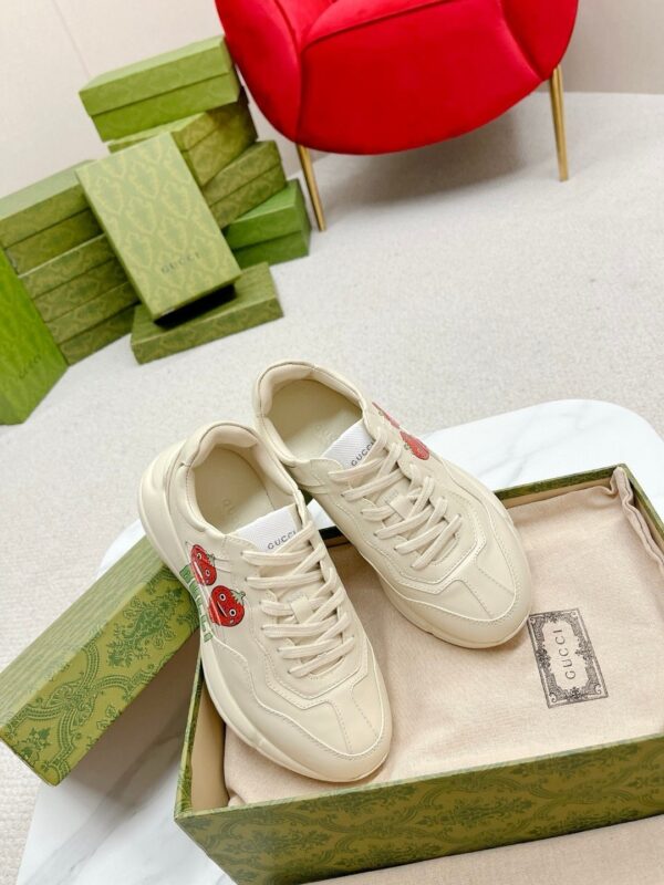 sy_no_38E11D82A9122100A41DA843EA6B6F7A_5 Gucci Rhyton Strawberry Print Sneaker – Ivory