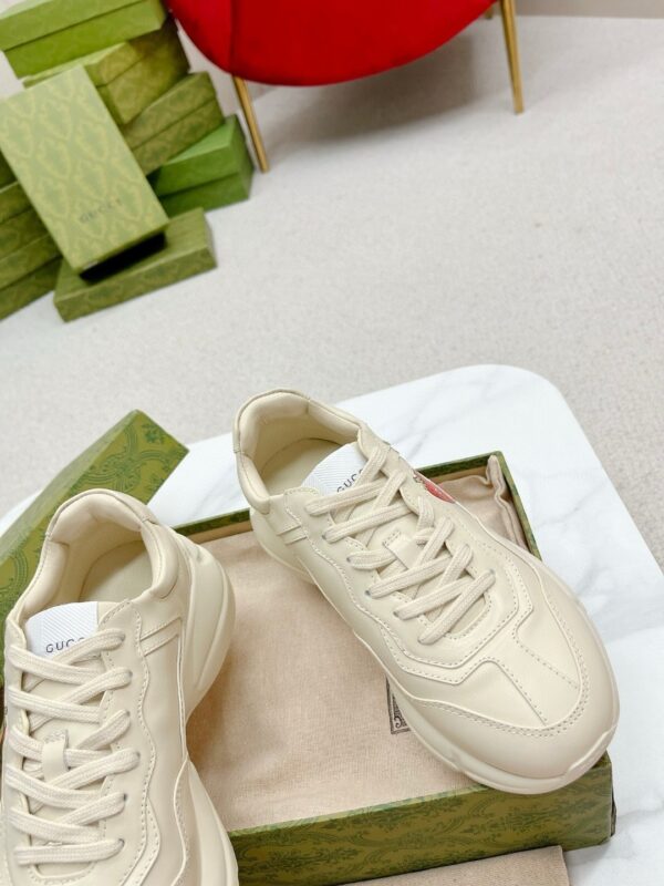 sy_no_38E11D82A9122100A41DA843EA6B6F7A_6 Gucci Rhyton Strawberry Print Sneaker – Ivory