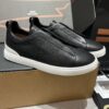 sy_no_39EDFE0EBD12732357DF48086166F6A0_1 Black Pebbled Leather Triple-Cross Slip-On Shoes