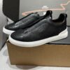 sy_no_39EDFE0EBD12732357DF48086166F6A0_2 Black Pebbled Leather Triple-Cross Slip-On Shoes