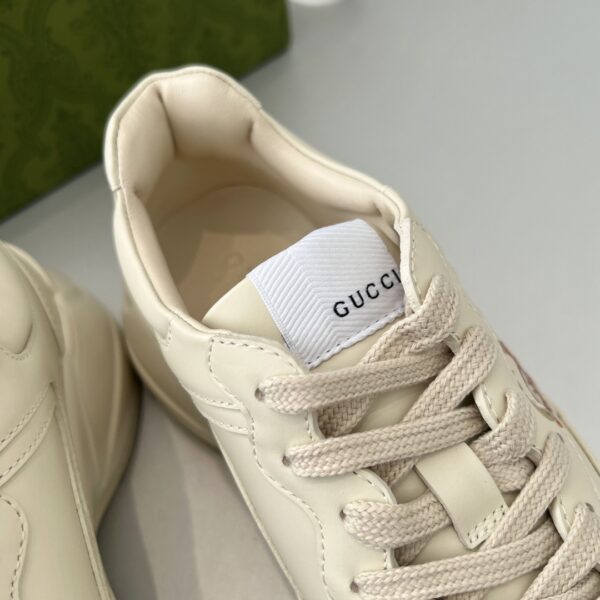 sy_no_3B6147E7F520C3673A90A8324575F077_5 Gucci x Disney Rhyton “Tigger” Sneaker in Off-White