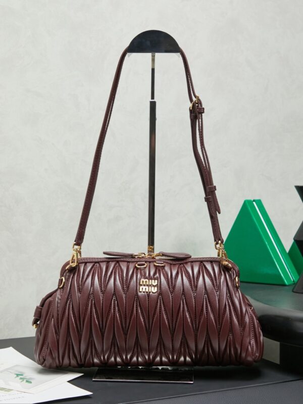 sy_no_3B81CB19F14FA4342AD0BB6B443F2F70_0 Burgundy Matelassé Shell Backpack