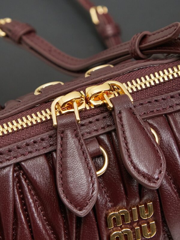 sy_no_3B81CB19F14FA4342AD0BB6B443F2F70_6 Burgundy Matelassé Shell Backpack