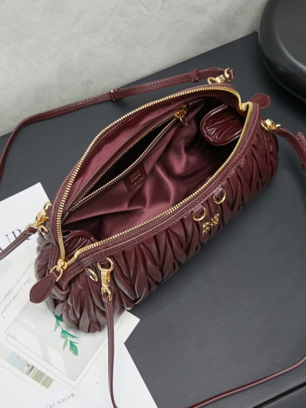 sy_no_3B81CB19F14FA4342AD0BB6B443F2F70_7 Burgundy Matelassé Shell Backpack