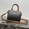 sy_no_403160B025A6C6B1AFA41F92D9A928CE_0 Small Triomphe Canvas Boston Bag