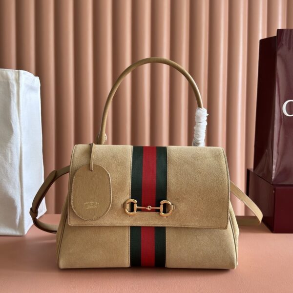 sy_no_40B40DAD48BD98FBC4C1CA2ED9DFF174_0 Generation Horsebit Top-Handle Suede Bag