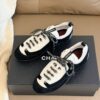 Chanel Retro Running Sneakers in Black & Beige