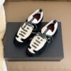 Chanel Retro Running Sneakers in Black & Beige