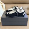 Chanel Retro Running Sneakers in Black & Beige