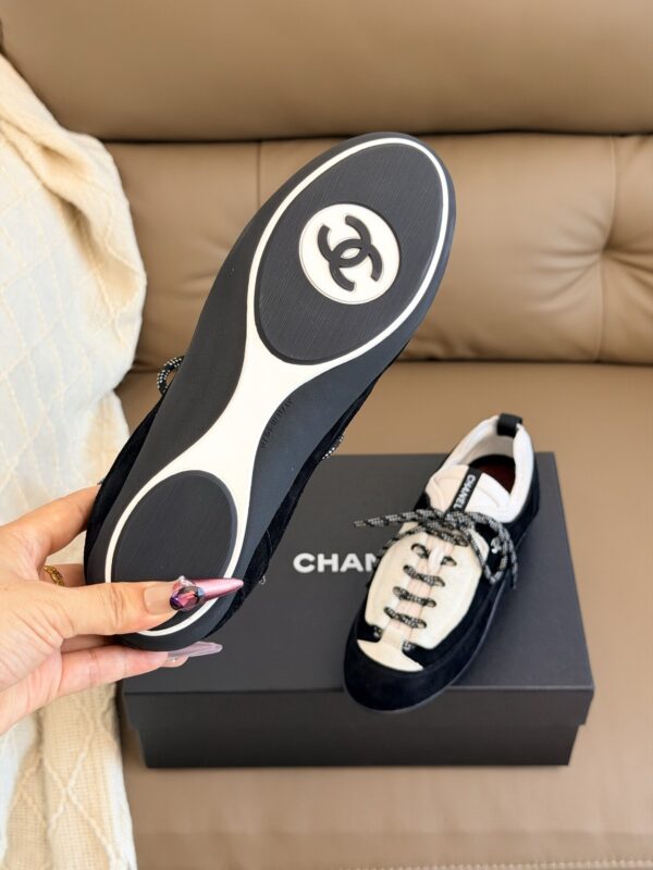 Chanel Retro Running Sneakers in Black & Beige