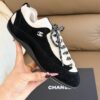 Chanel Retro Running Sneakers in Black & Beige