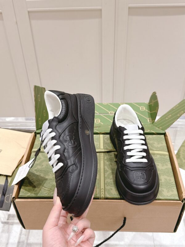 sy_no_4B1831A4BB6051906896D89506B985E7_1 Gucci GG Embossed Leather Platform Sneaker – Black / White