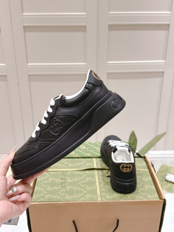 sy_no_4B1831A4BB6051906896D89506B985E7_2 Gucci GG Embossed Leather Platform Sneaker – Black / White