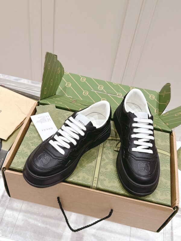 sy_no_4B1831A4BB6051906896D89506B985E7_4 Gucci GG Embossed Leather Platform Sneaker – Black / White
