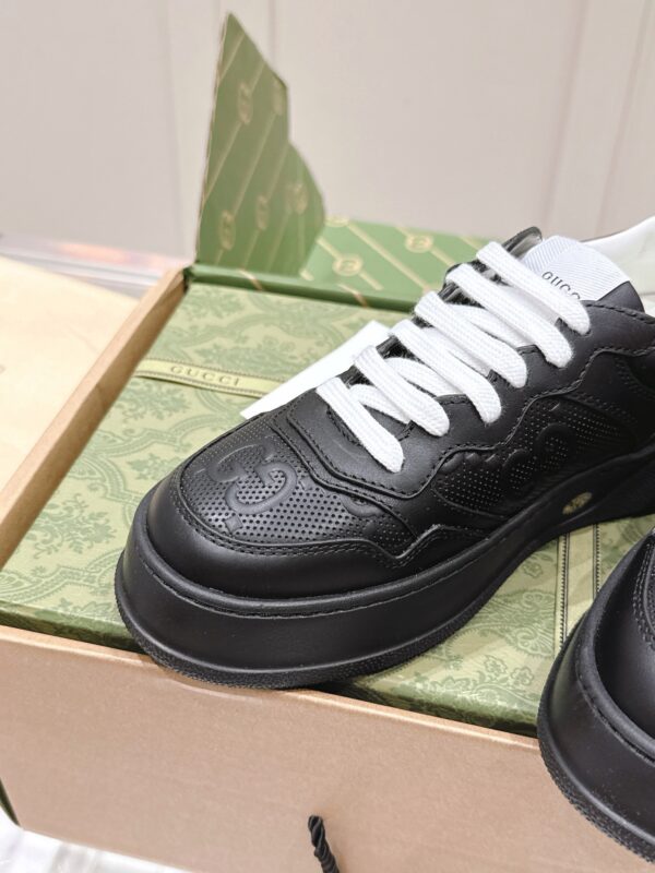 sy_no_4B1831A4BB6051906896D89506B985E7_5 Gucci GG Embossed Leather Platform Sneaker – Black / White