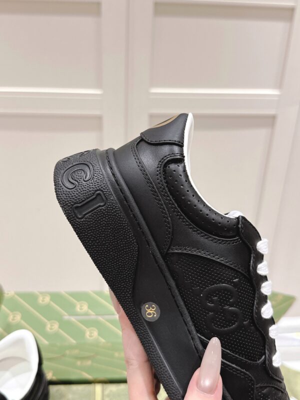 sy_no_4B1831A4BB6051906896D89506B985E7_6 Gucci GG Embossed Leather Platform Sneaker – Black / White