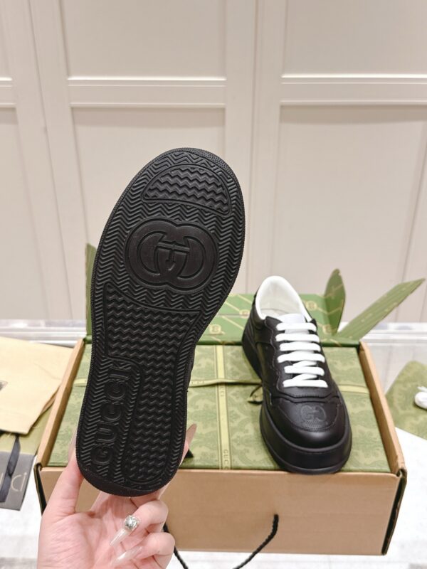 sy_no_4B1831A4BB6051906896D89506B985E7_8 Gucci GG Embossed Leather Platform Sneaker – Black / White