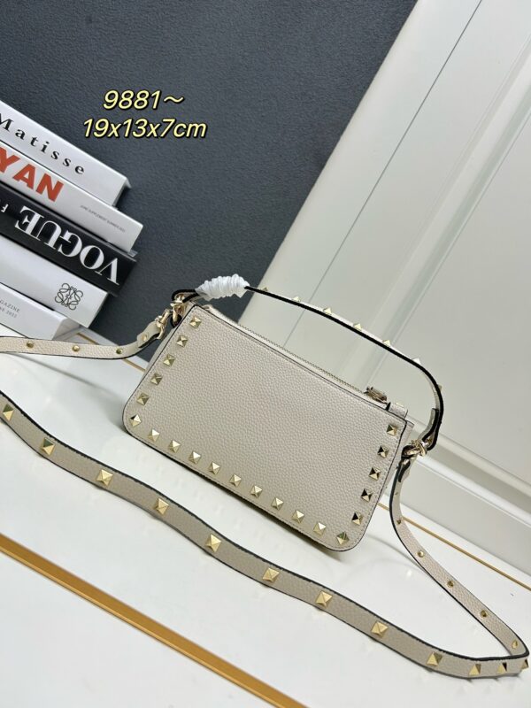 sy_no_4FF1225B6E04C7A86EA0CF1EB734D325_2 Valentino Garavani Rockstud Small Leather Crossbody Bag – White
