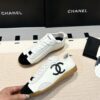 Chanel Low-Top Sneakers in Black & White