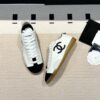 Chanel Low-Top Sneakers in Black & White