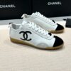 Chanel Low-Top Sneakers in Black & White