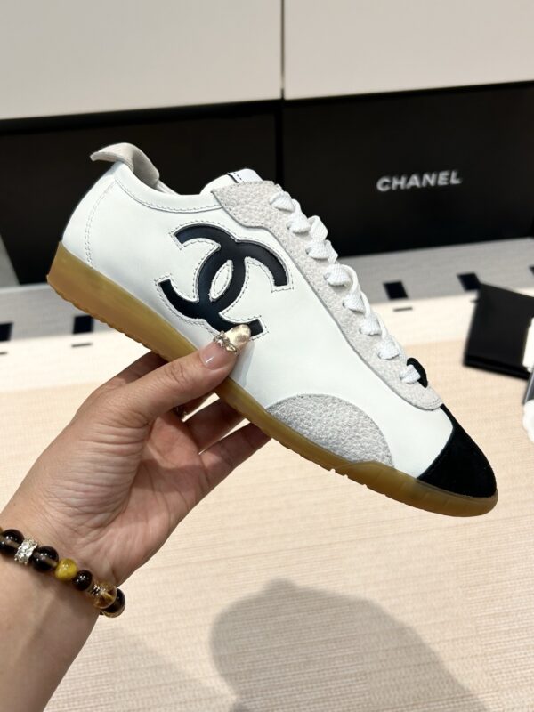 Chanel Low-Top Sneakers in Black & White