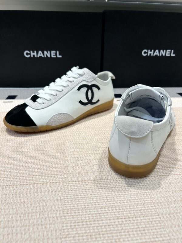 Chanel Low-Top Sneakers in Black & White