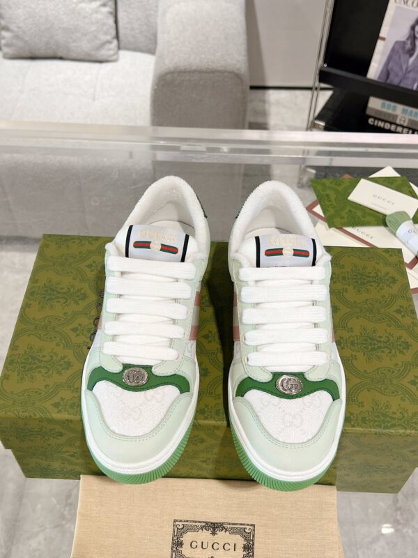 sy_no_56DE7300125705235038A673825D4097_0 Gucci Screener Sneaker in Mint Green Leather & White GG Canvas with Pink Web Stripe