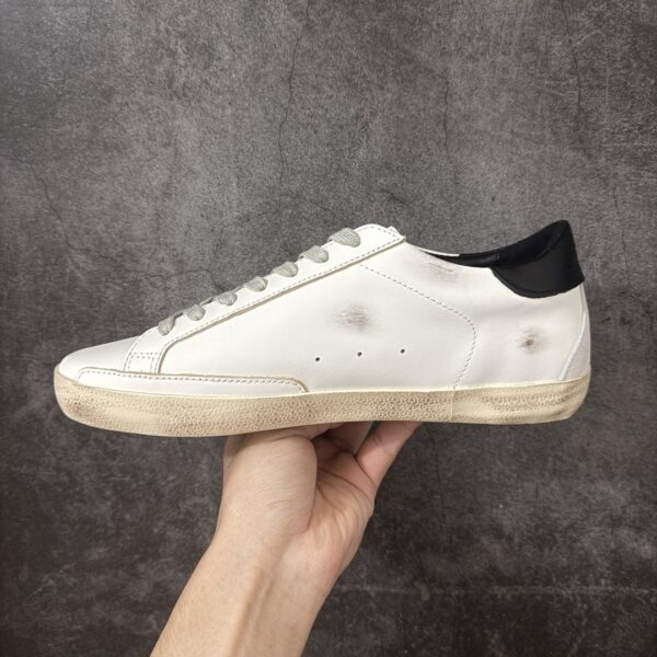 sy_no_59837ACE871707DF25BB843EB46D5564_1 White, Black & Grey Suede Star Retro Sneakers