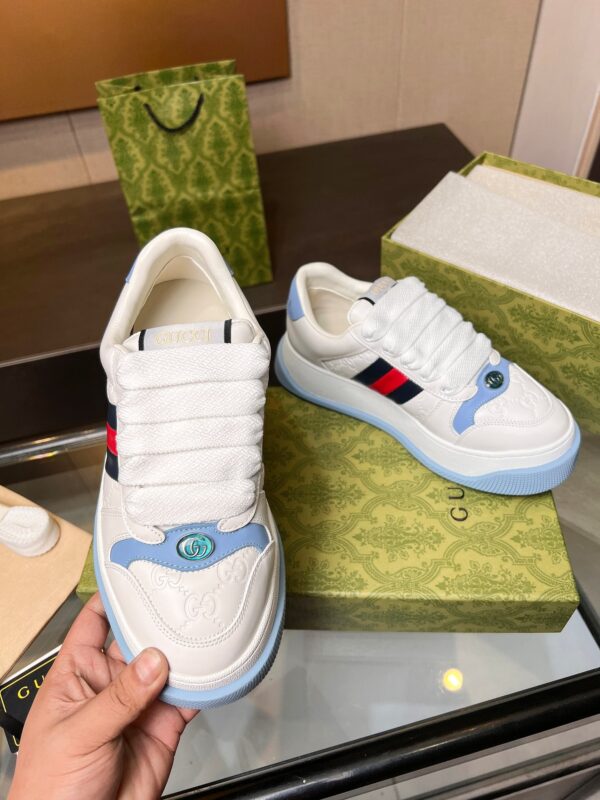sy_no_610A6312E193639ECD93235F438E77D9_0 Gucci Screener White Leather GG Embossed Chunky Lace Sneaker
