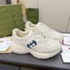 sy_no_61C110CC52F69EBD6044D3BF0BF10672_1 Gucci Rhyton Leather Sneaker in Off-White with Blue Interlocking G Logo