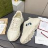 sy_no_61C110CC52F69EBD6044D3BF0BF10672_3 Gucci Rhyton Leather Sneaker in Off-White with Blue Interlocking G Logo