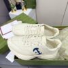 sy_no_61C110CC52F69EBD6044D3BF0BF10672_4 Gucci Rhyton Leather Sneaker in Off-White with Blue Interlocking G Logo