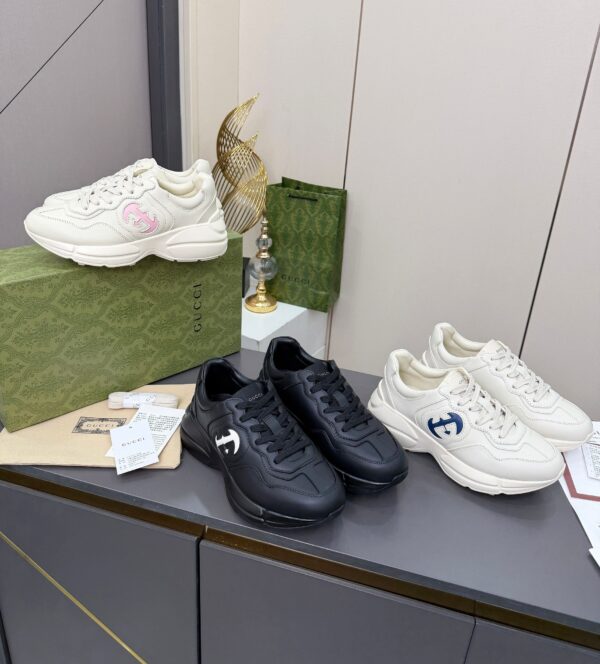 sy_no_61C110CC52F69EBD6044D3BF0BF10672_7 Gucci Rhyton Leather Sneaker in Off-White with Blue Interlocking G Logo
