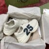 sy_no_627D806077E74C3578EE15D5D1F7D27D_0 Gucci Rhyton Ivory Leather “25” Print Chunky Sneakers