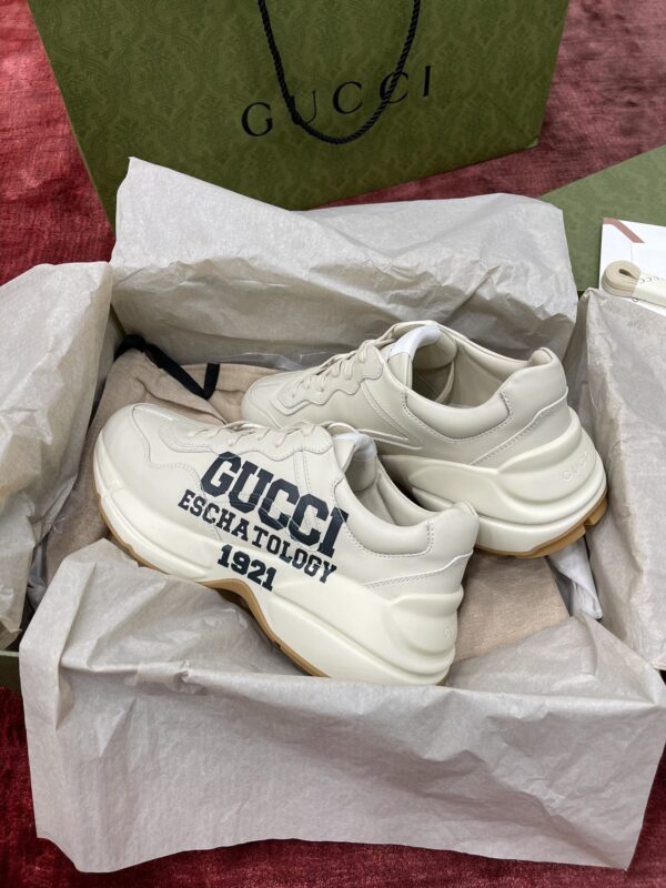 sy_no_627D806077E74C3578EE15D5D1F7D27D_1 Gucci Rhyton Ivory Leather “25” Print Chunky Sneakers