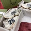 sy_no_627D806077E74C3578EE15D5D1F7D27D_2 Gucci Rhyton Ivory Leather “25” Print Chunky Sneakers