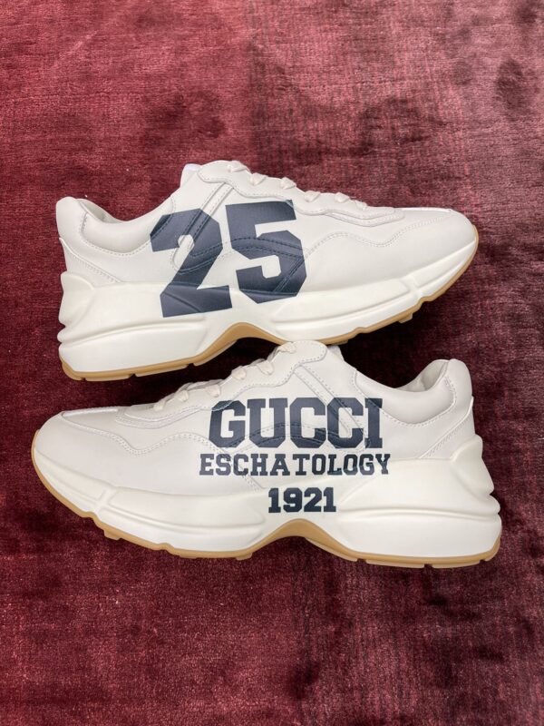 sy_no_627D806077E74C3578EE15D5D1F7D27D_3 Gucci Rhyton Ivory Leather “25” Print Chunky Sneakers