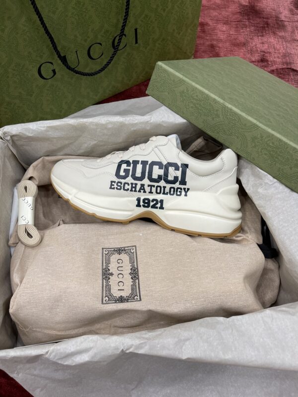 sy_no_627D806077E74C3578EE15D5D1F7D27D_4 Gucci Rhyton Ivory Leather “25” Print Chunky Sneakers