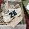 sy_no_627D806077E74C3578EE15D5D1F7D27D_5 Gucci Rhyton Ivory Leather “25” Print Chunky Sneakers