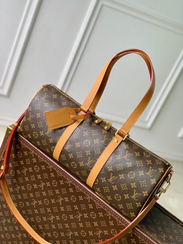 sy_no_635752BBCD6FD43CAE5F1E4E3BED4310_0 Louis Vuitton Needle Handbag – Monogram Coated Canvas