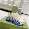 sy_no_64EE0CCBBA4ACEC7EB59A18A526629AB_0 Gucci Rhyton Ivory Leather Wave Print Chunky Sneakers