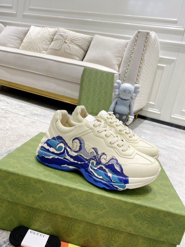 sy_no_64EE0CCBBA4ACEC7EB59A18A526629AB_0 Gucci Rhyton Ivory Leather Wave Print Chunky Sneakers