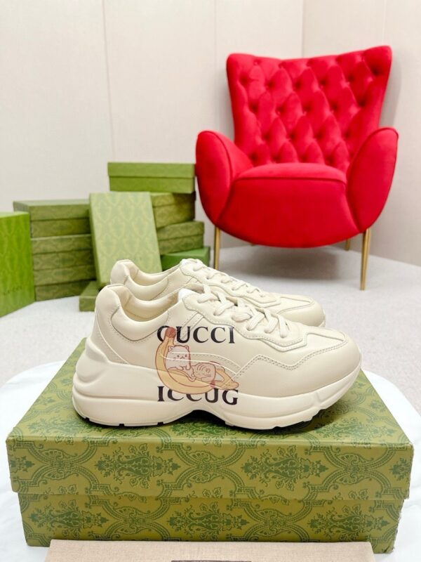 sy_no_64F0A198F01C4E2FFA255155F1BF7702_0 Gucci Rhyton Leather Sneaker in Off-White